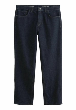 Sötétkék, egyenes szabású farmernadrág; öt zsebbe, gombos záródásra, és kontrasztos sárga varrásra van szüksége a varratok mentén.