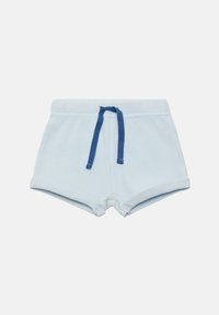 Bermudas de algodón azul claro con un patrón de waffle texturizado, que cuentan con un cordón azul y dobladillos doblados.