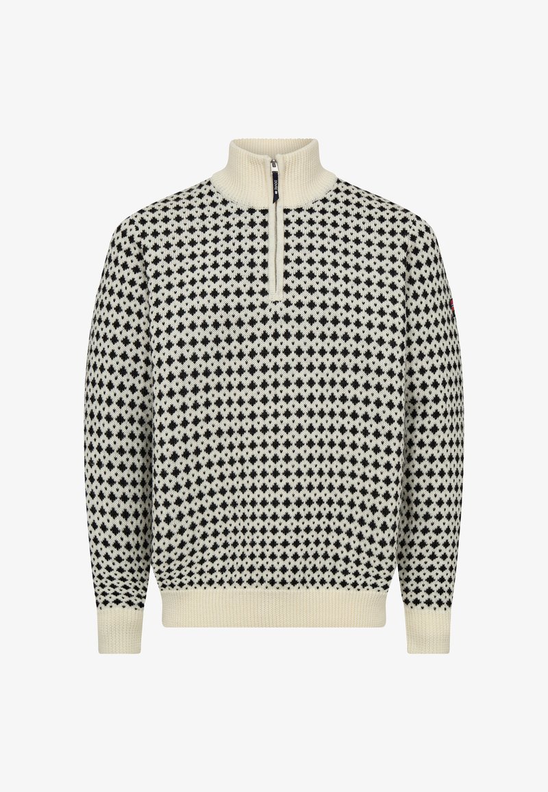Striktrøje med høj krave, der har et sort og cremefarvet diamantmønster. Lynlås lukning ved halsen, ribbede manchetter og kant.