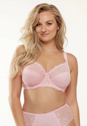 Roze kanten beha met doorzichtige delen, bloemenpatroon en een klein strikje in het midden. Verstelbare bandjes en beugels voor ondersteuning.