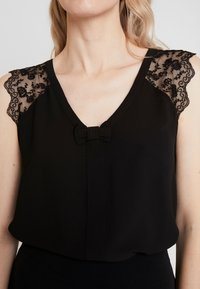 NAF NAF Blůza - black