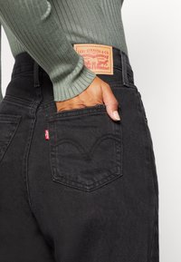 Levi's® Těhotenské džíny - destroyed denim