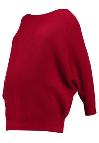 Punainen neulepusero, jossa on olkapäät paljastava muotoilu ja kolme neljännestä hihaa, jossa on rento leikkaus ja ribbitekstuuri.