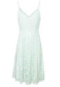 Spetsklänning i ljus mynta, med en åtsittande överdel, utsvängd kjol, justerbara tunna axelband och blommönster över hela.