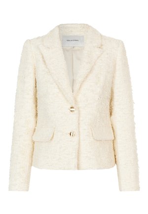 Blazer texturizado en color crema con cuello con muescas, dos bolsillos frontales y cierres de botón dorados. Fabricado con un material suave y tejido.