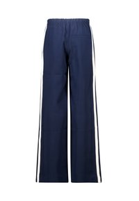 Navy blue wide-leg pants with an elastic waistband, featuring white side stripes and a back pocket. Smooth fabric with a crisp finish.