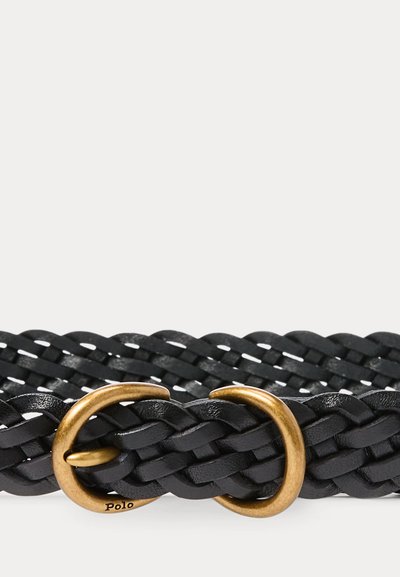 Juodas pintas odinis diržas su apvalia antikinės aukso spalvos sagtimi ir kilpele.