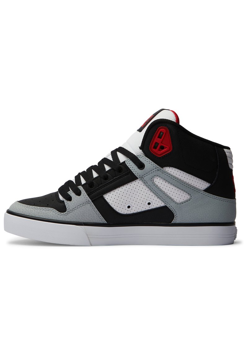 High-top sneaker in black, gray, and white leather, featuring perforated panels, black laces, and red accents on the tongue and heel.