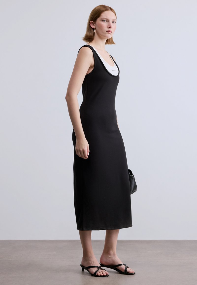 black and pink mini dress Novara Mini Dress in Pink