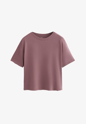 T-shirt à manches courtes, à coupe décontractée, dans une couleur mauve douce. Tissu doux avec un col rond et un design simple, sans motifs ni embellissements.
