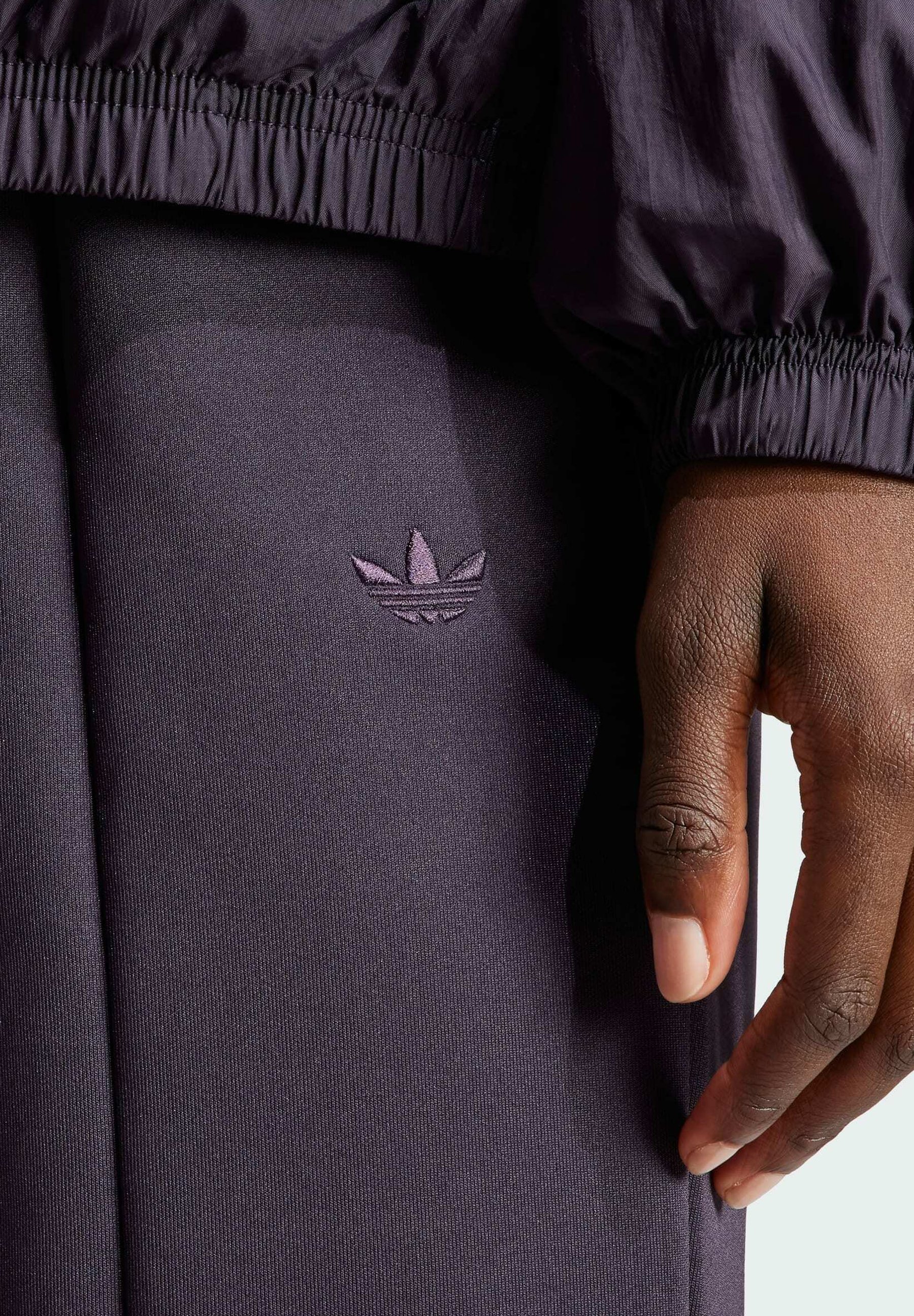 black and purple adidas pants