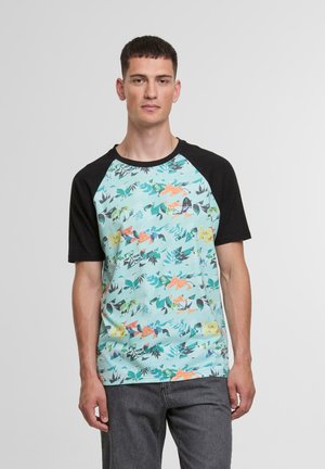 Short-sleeve t-shirt with a mint green floral pattern, black sleeves, and a crew neck. Made from a lightweight fabric.