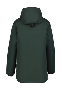 Tummanvihreä eristetty talvitakki huppulla ja pitkillä hihoilla, näkyy takaa valkoista taustaa vasten.