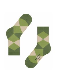 Chaussettes vertes et beiges avec un motif en losange, en maille douce, avec un poignet contrastant et un petit logo près de la cheville.