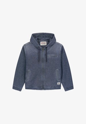 Sweat à capuche zippé en denim avec cordon de serrage, deux poches avant et une petite poche poitrine, avec étiquette de la marque Guess à l’intérieur du col.