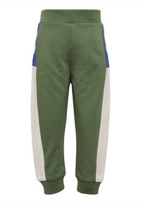 Green cotton sweatpants with blue and cream side panels, ribbed waistband, and cuffs. Soft texture with a tapered leg design.