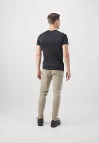 Puma Spodnji deli trenirk - oak branch