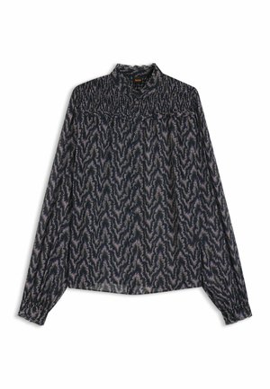 Langarmblouse van lichtgewicht stof met een donkerblauw zigzagpatroon en een gesmokt decolleté. Heeft een knoopsluiting en gerimpelde manchetten.