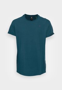 LASH - T-shirt básica - compact o peach midnight blue