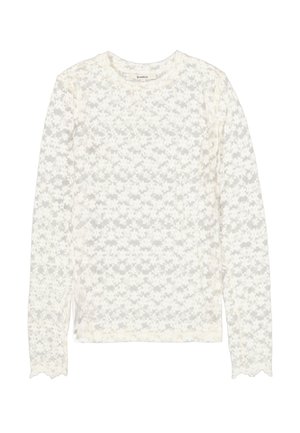 Witte kanten top met lange mouwen en een bloemenpatroon, ronde halslijn en golvende manchetten. Gestructureerde stof met een fijn, open geweven patroon.