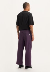 Levi's® Skateboarding SKATE CROP CARPENTER - Traperice opuštenog kroja - night shade x