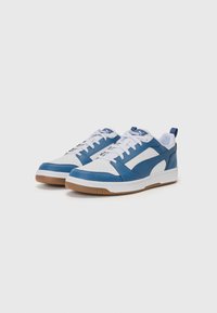 Blue and white athletic shoes with a rubber sole, lace-up design, perforated toe box, and a small blue heel tab.