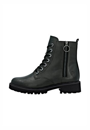 Bottines à lacets en cuir vert foncé avec une fermeture éclair sur le côté, semelle en caoutchouc noir et accents en métal argenté. Fini texturé.