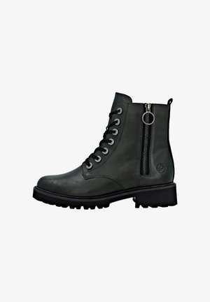 Bota de tobillo con cordones en piel verde oscuro, con cremallera lateral, suela de goma negra y detalles en acero inoxidable. Acabado texturizado.