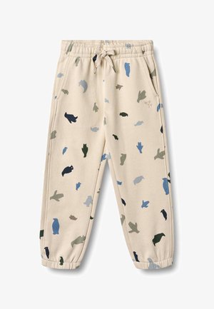 Bež trenirka s elastičnim pasom, okrašena z igrivim vzorcem ptic v temno zeleni, modri in svetlo modri barvi.