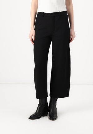SOUGHT - Trousers - black