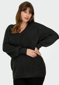 Čierny pletený sveter s výstrihom do V, s textúrovaným herringbone vzorom a balónovými rukávmi, navrhnutý pre voľný strih.