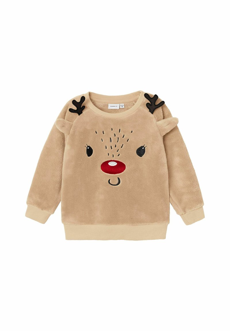 Beige plyssweatshirt med rensdyrmotiv, der har rød næse, sorte horn og broderede øjne. Ribbet halsudskæring og manchetter.