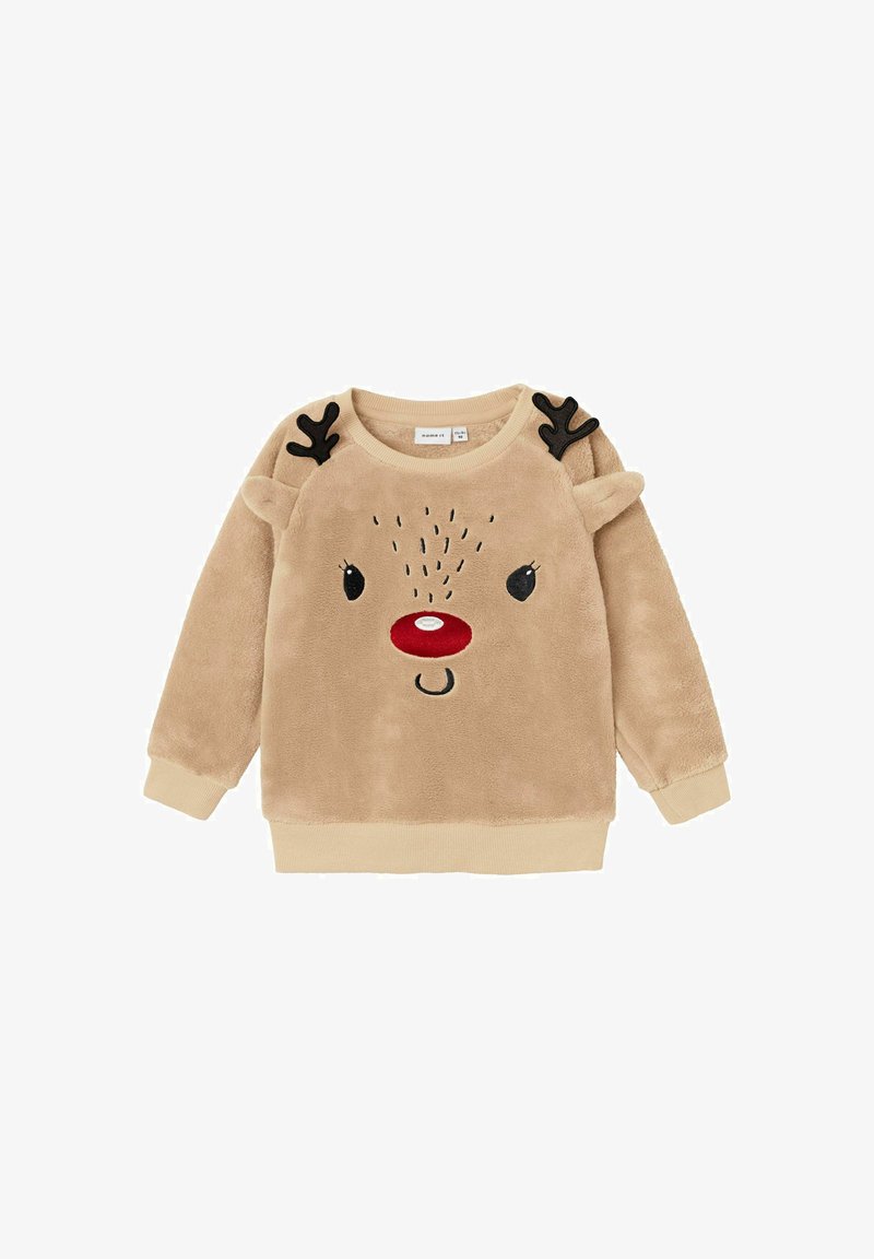 Beige Plüsch-Sweatshirt mit Rentiergesichtsdesign, das eine rote Nase, schwarze Geweihakzente und gestickte Augen aufweist. Gerippter Halsausschnitt und Bündchen.