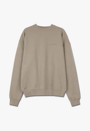 Beżowy sweter z okrągłym dekoltem, z ściągaczami przy mankietach i u dołu. Posiada haftowany tekst na klatce piersiowej. Wykonany z miękkiego, teksturowanego materiału.