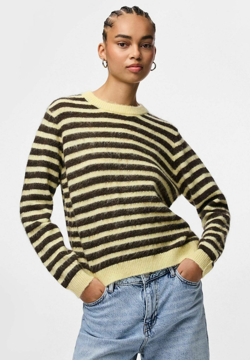 Striped sweater featuring dark brown and light yellow colors, made of soft material, with a crew neckline and ribbed hem. Casual fit.