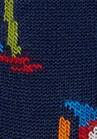 Tessuto a maglia con una base blu scuro che presenta motivi geometrici colorati in rosso, giallo, blu e verde. Design vibrante e dalla texture interessante.