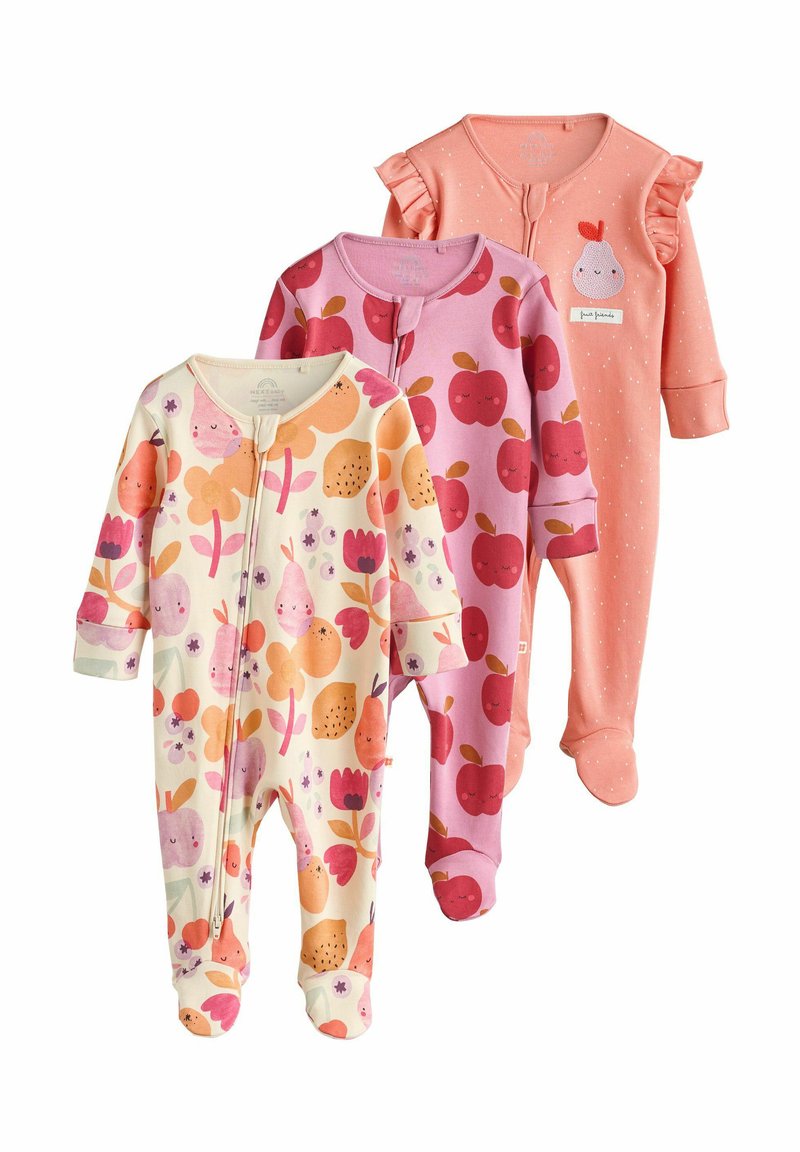 Three baby onesies: left in cream with fruit patterns, middle in pink with apple prints, right in solid pink with ruffles and white dots.