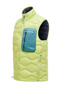 Limegrüwestes gepolsterte Weste mit einem dunkelblauen Innenfutter, ausgestattet mit einer Fronttasche mit Reißverschluss in Türkis, welliger Textur und verstellbarem Saum.