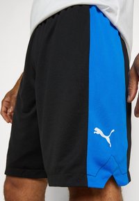 Puma SHOT BLOCKER SHORT - Spordišortsid - black/racing blue
