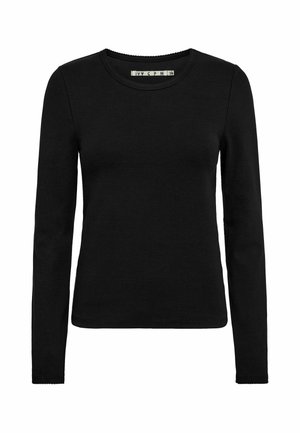Chemise noire ajustée à manches longues avec encolure ronde et étiquette de taille visible à l’intérieur du col.