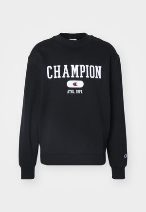 Črna mikica z besedo "CHAMPION" v belem, pod njo pa "ATHL. DEPT." Ribana okrogla ovratnica in manšete, mehak material.