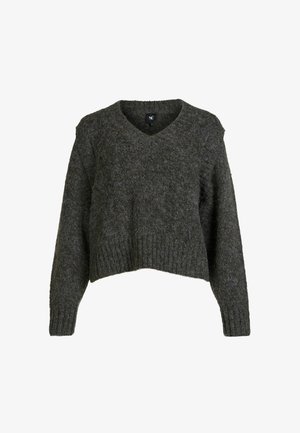 Temně zelený, zkrácený svetr vyrobený z texturované pleteniny. Obsahuje hluboký výstřih do V a dlouhé rukávy s ribovanými manžetami a lemem.