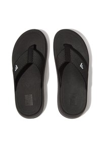 Zwarte teenslippers met een getextureerde rubberen zool, een mesh teenband en een versterkte enkelsectie; minimalistische branding in het wit.