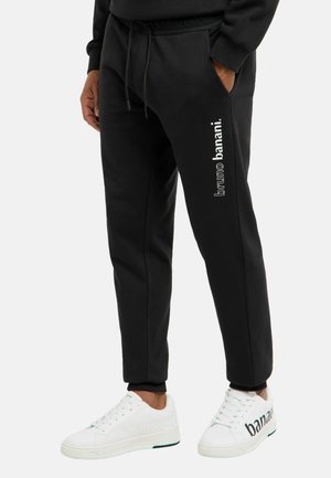 GARDNES - Træningsbukser - schwarz