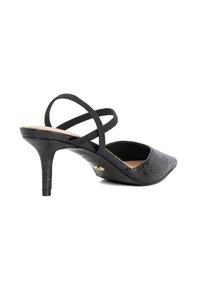 Black heeled slingback shoe with a pointed toe and textured leather upper. Features two crisscross straps and a slim stiletto heel.