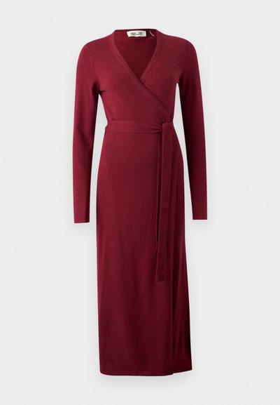 Burgundy wrap dress made of soft fabric, featuring long sleeves, a V-neck, and a tie closure at the waist, with a straight hem.