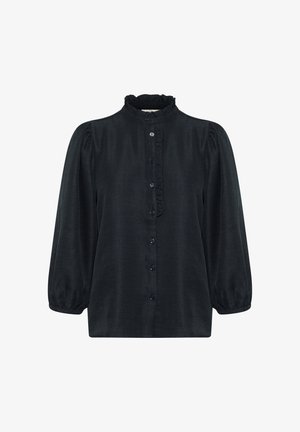 Črna srajca z gumbi, z volančki na ovratniku, dolgimi puff rokavi in sproščenim krojem. Ima majhne mornarsko modre gumbe spredaj. Mehka tkanina.