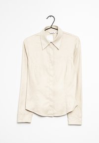 Beżowa koszula z długim rękawem, z kołnierzykiem, slim fit, teksturowana tkanina, z ozdobnym przeszyciem wzdłuż bocznych szwów i zapięciem na guziki.