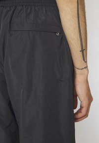 Nike Sportswear PANT - Joggebukse - black/coconut milk