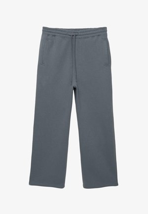 Grijze sweatpants van zacht materiaal, met een drawstring tailleband, twee zijzakken en een relaxte pasvorm. Gladde textuur zonder zichtbare patronen.